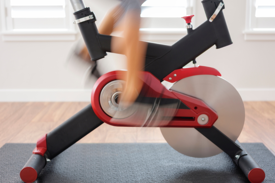 Image of an exercise bike on a rubber mat