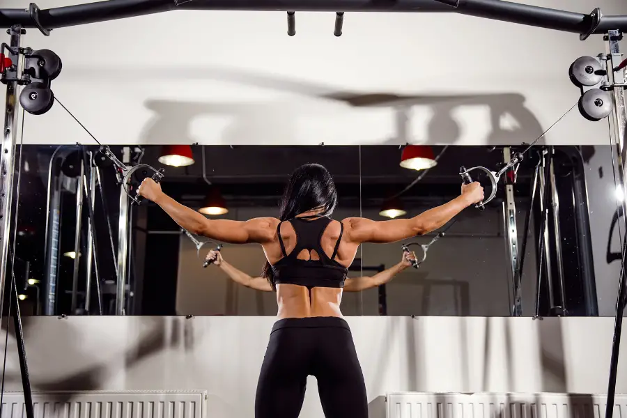 Woman using a functional trainer